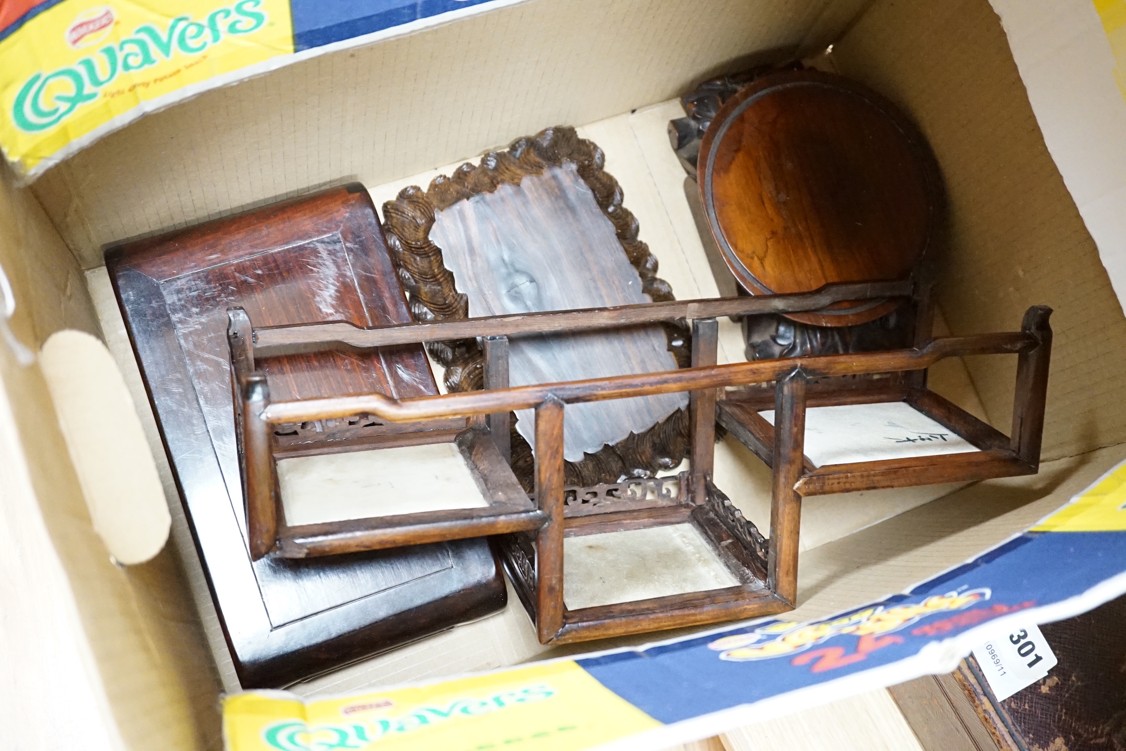 Two Chinese wood figures, various wood stands (one inset marble), in two boxes